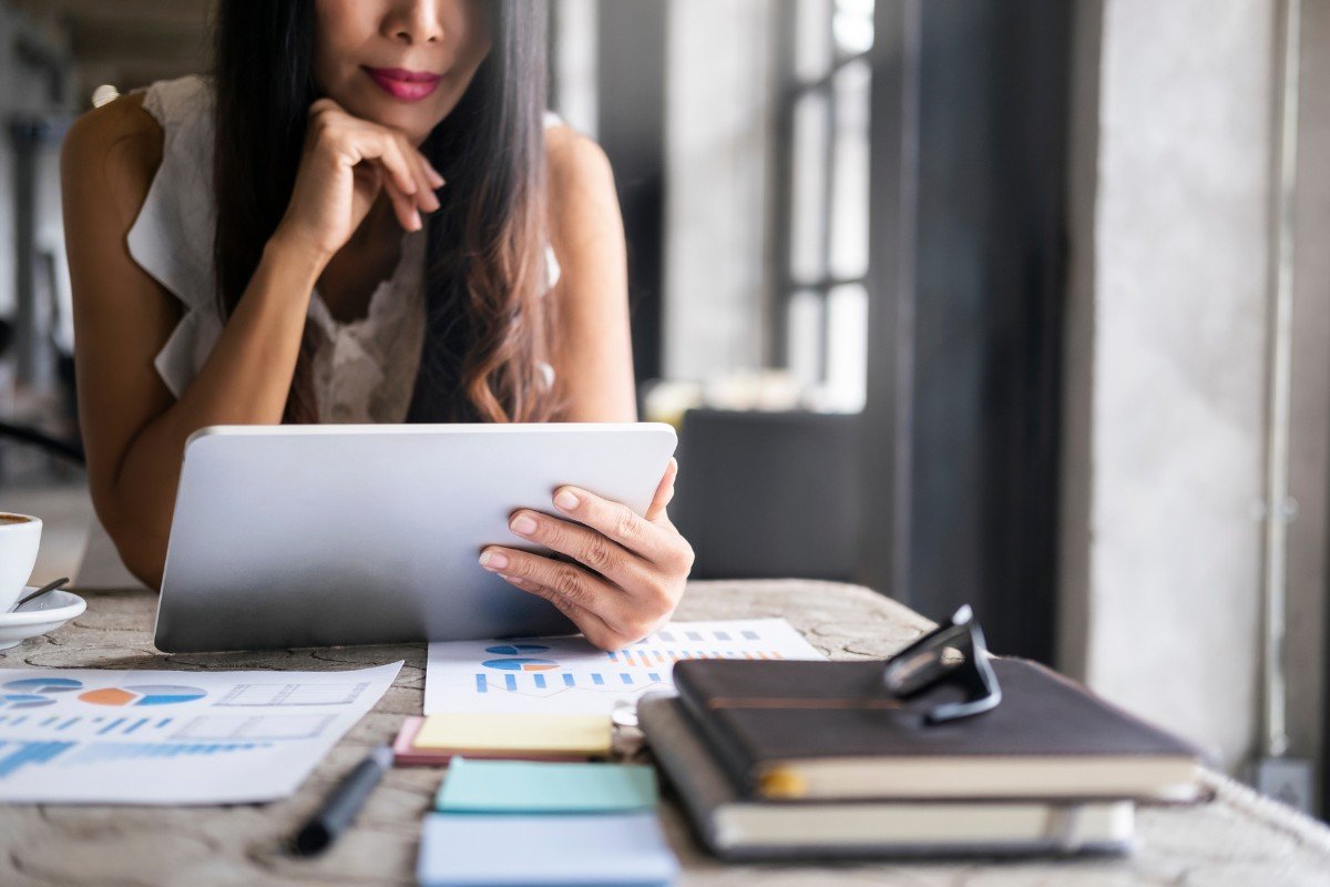 A woman reviews her investment portfolio.